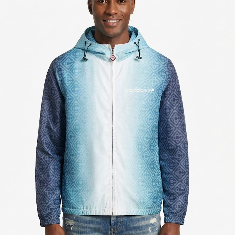 A man wearing a hooded zip-up jacket with a light blue to white gradient center, patterned blue sleeves, and a white 'codalancer' logo on the chest, set against a plain white background.