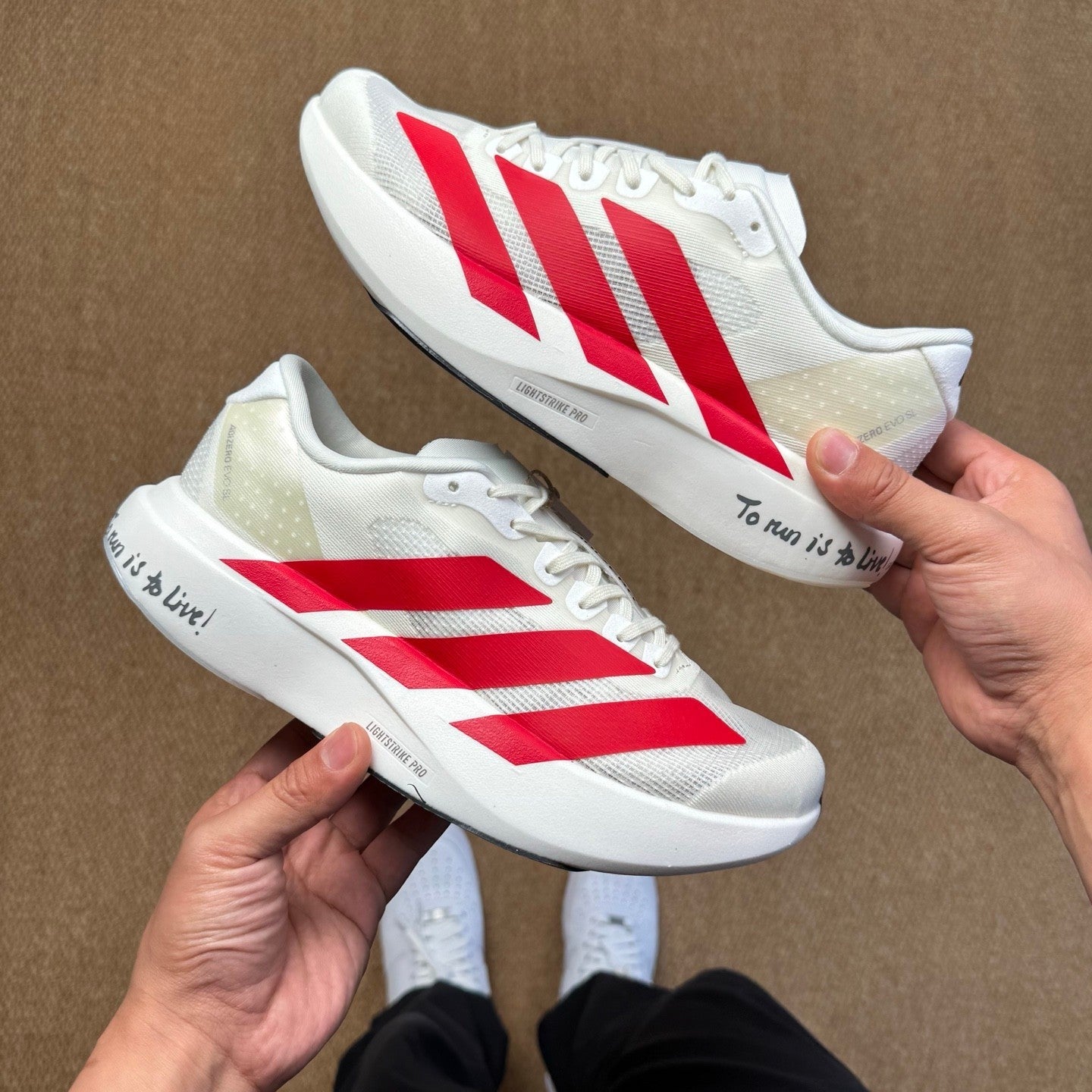 ADI*DAS  AD Adizero Evo SL Sneakers 2 Color's