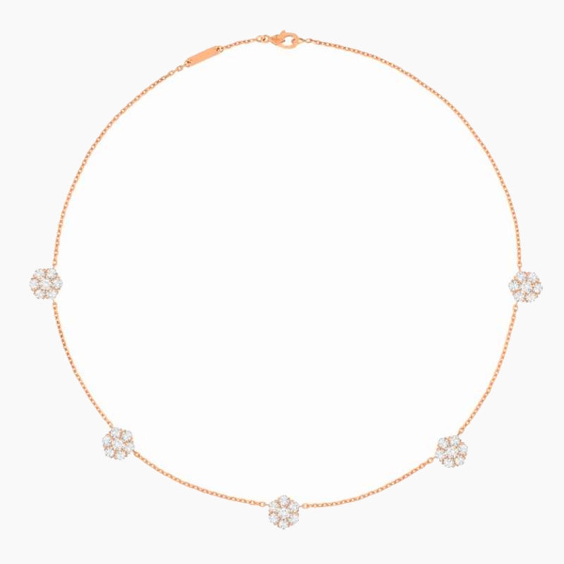 A delicate rose gold chain necklace featuring five small, round cluster floral motifs set with clear stones, displayed on a clean white background.